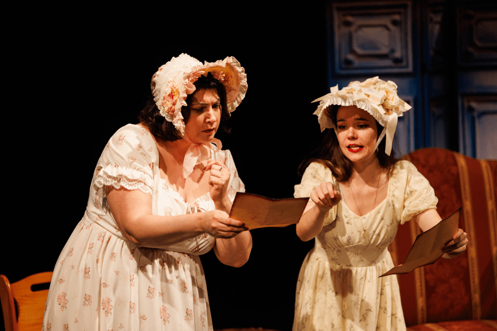Meg Page (Yana White, at left) and Alice Ford (Hadassah Misner) compare notes in the "Letter Scene" from Verdi's "Falstaff."