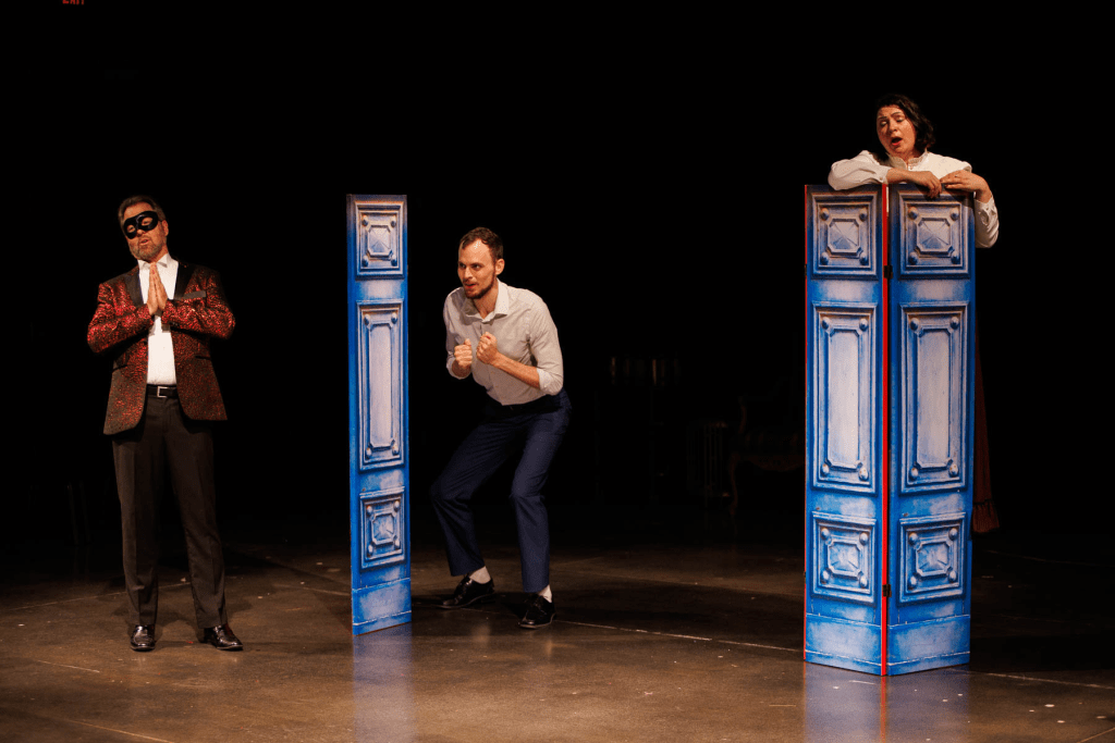 Don Giovanni (Blake Davidson, at left) predicts his success, Leporello (Will Derusha, center) provides commentary, and Donna Elvira (Yana White) does not yet notice them, in "Ah, chi mi dice mai" from Mozart's "Don Giovanni".