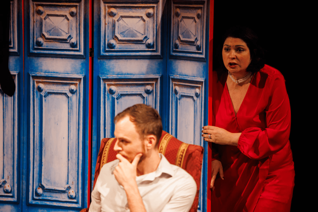 Sibella (Yana White, at left) tries to make sense of the scene as Monty (Will Derusha) listens to Phoebe in "I've Decided to Marry You" from Lutvak's "A Gentleman's Guide to Love and Murder."