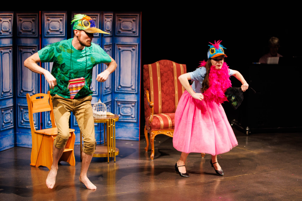 Papageno (Will Derusha, at left) and Papagena (Hadassah Misner) flap their wings together in "Pa-pa-pa-pa" from Mozart's "The Magic Flute".