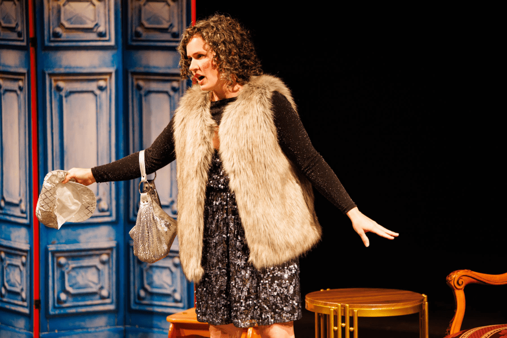 Périchole (Courtney Lacey) returns from a feast, in the "Tipsy Aria" from Offenbach's "La Périchole".