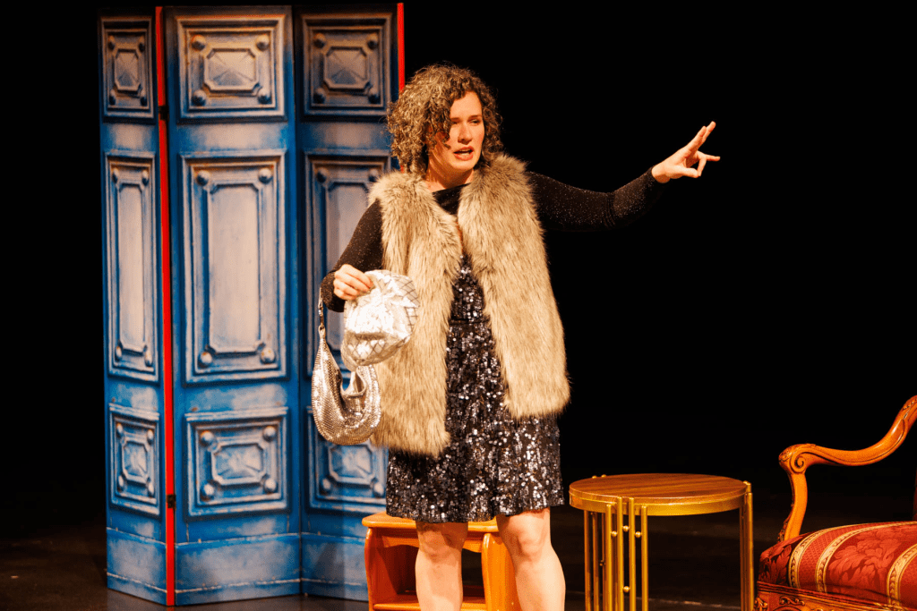 Périchole (Courtney Lacey) describes the wonderful food and wine, in the "Tipsy Aria" from Offenbach's "La Périchole".