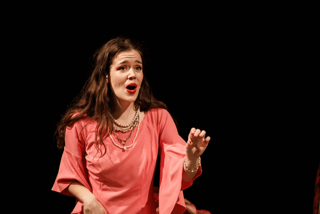 Josephine (Hadassah Misner) considers her choices, in "A simple sailor, lowly born" from Gilbert and Sullivan's "H.M.S. Pinafore".