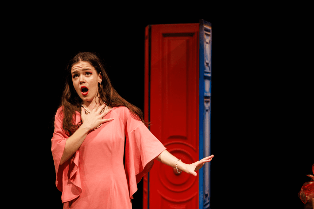 Josephine (Hadassah Misner) tries to decide, in "A simple sailor, lowly born" from Gilbert and Sullivan's "H.M.S. Pinafore".